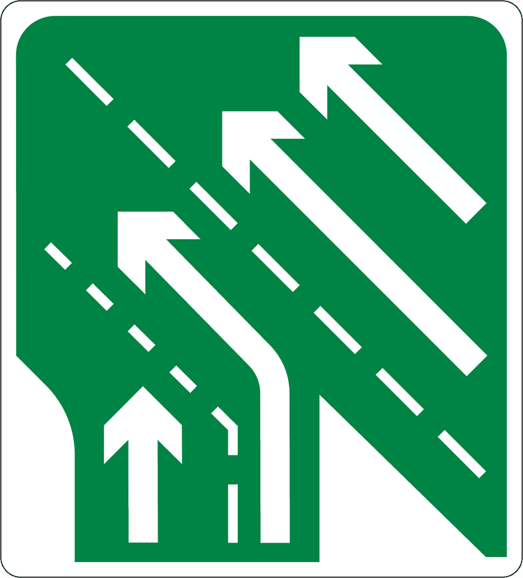 A common road sign in Ireland for additional lanes joining from right - right joining lane continues (two to three lanes). Driving Theory Test revision.
