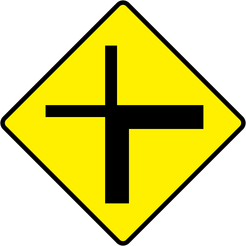 A triangular warning traffic sign in Ireland depicting crossroads at sharp corner - left. Memorize for DTT.