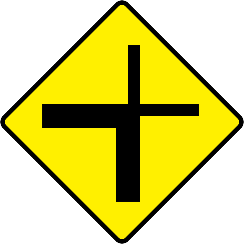 A triangular warning traffic sign in Ireland depicting crossroads at sharp corner - right. Memorize for DTT.