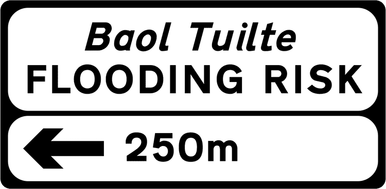 A common road sign in Ireland for hazard - direction and distance. Driving Theory Test revision.