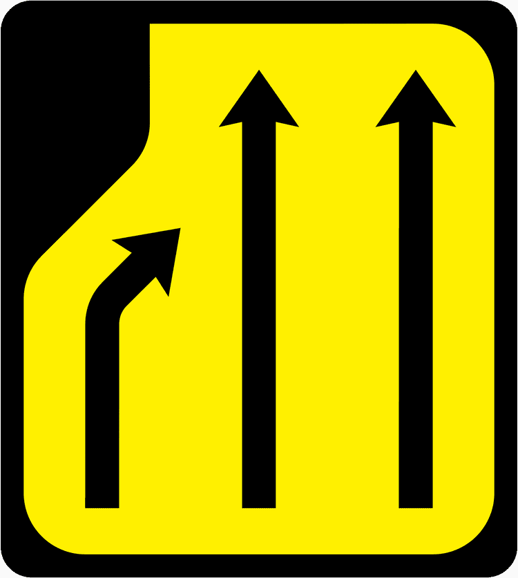A triangular warning traffic sign in Ireland depicting lane loss (three to two lanes) - left. Memorize for DTT.