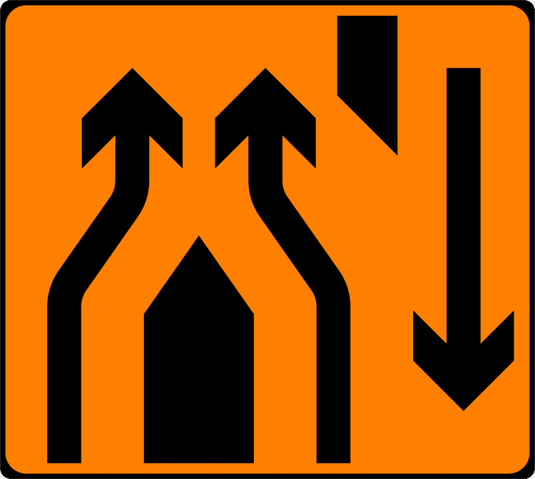 A common road sign in Ireland for lanes rejoin at crossover. Driving Theory Test revision.