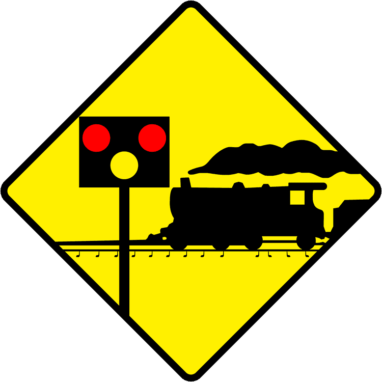A triangular warning traffic sign in Ireland depicting level crossing with flashing red signals. Memorize for DTT.