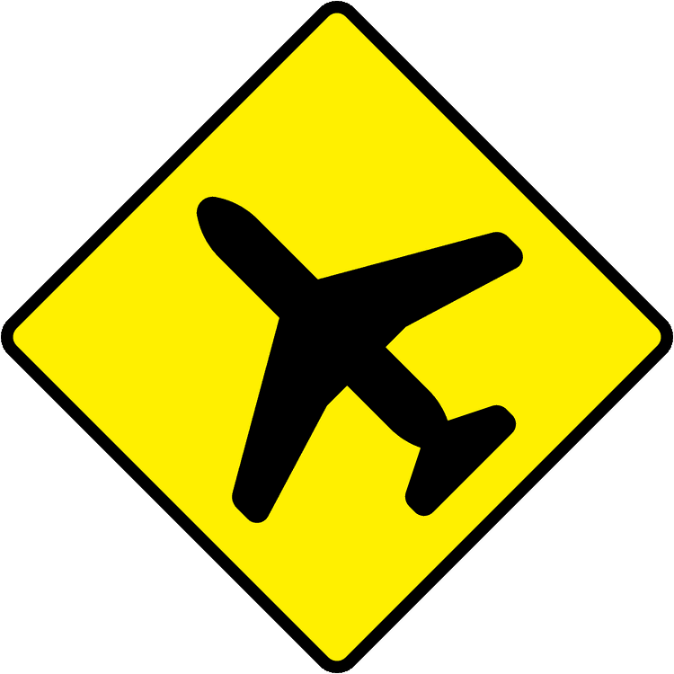 Irish Warning Sign: Low-flying Aircraft - Driving Theory Test Prep A triangular warning traffic sign in Ireland depicting low-flying aircraft. Memorize for DTT.