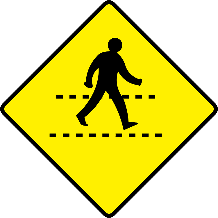 A triangular warning traffic sign in Ireland depicting pedestrians crossing. Memorize for DTT.