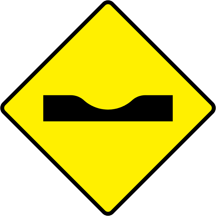 Irish Warning Sign: Road Depression - Driving Theory Test Prep A triangular warning traffic sign in Ireland depicting road depression. Memorize for DTT.