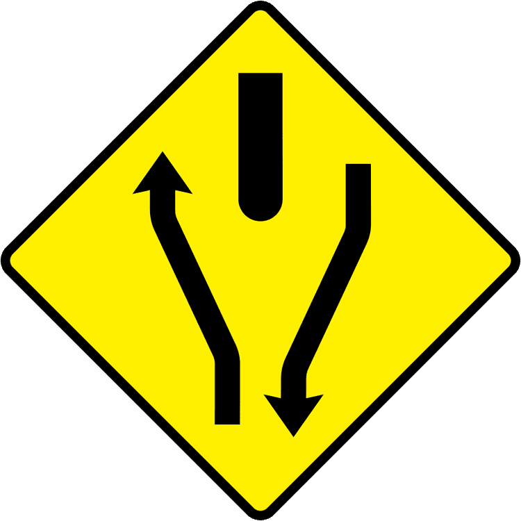 Irish Warning Sign: Road Divides - Driving Theory Test Prep A triangular warning traffic sign in Ireland depicting road divides. Memorize for DTT.
