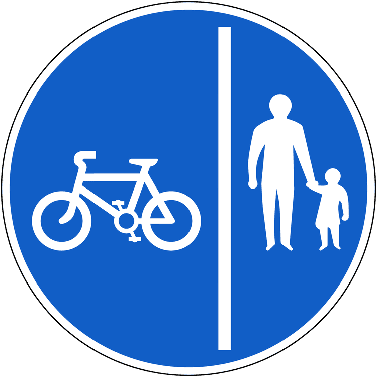 A regulatory road sign in Ireland enforcing segregated route for pedal cycles and pedestrians (cycle on left). Essential for the Driving Theory Test.