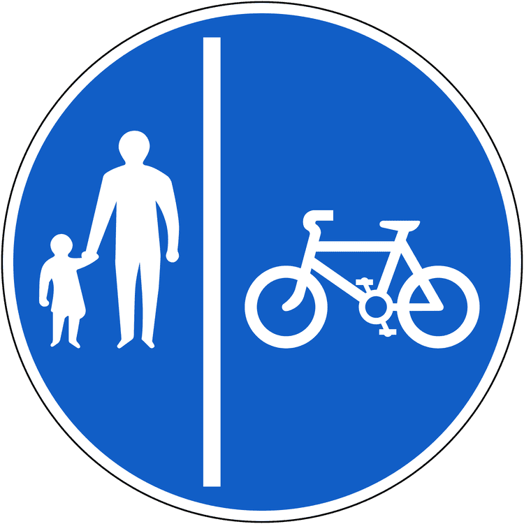 A regulatory road sign in Ireland enforcing segregated route for pedal cycles and pedestrians (cycle on right). Essential for the Driving Theory Test.
