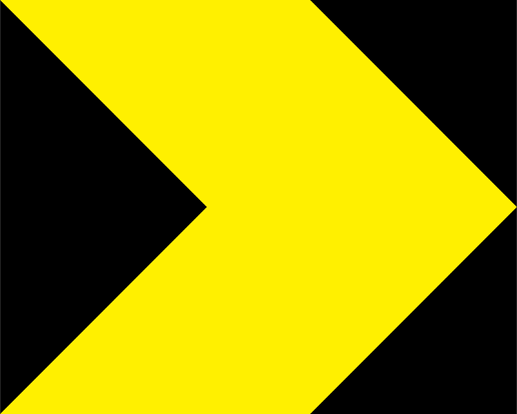 A triangular warning traffic sign in Ireland depicting single chevron - right. Memorize for DTT.