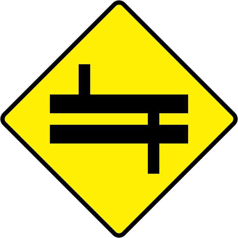 Irish Warning Sign: Staggered Crossroads Ahead at Dual C'way - Left - Driving Theory Test Prep A triangular warning traffic sign in Ireland depicting staggered crossroads ahead at dual c'way - left. Memorize for DTT.
