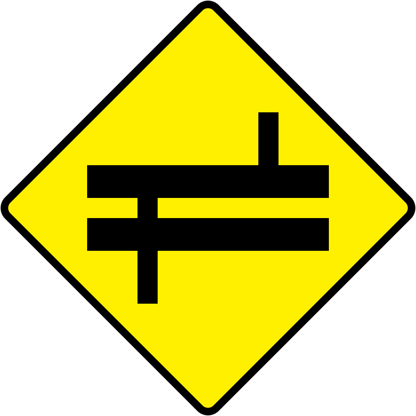 A triangular warning traffic sign in Ireland depicting staggered crossroads ahead at dual c'way - right. Memorize for DTT.