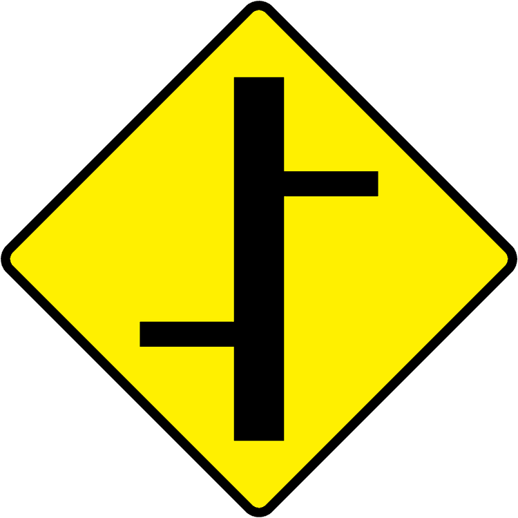 A triangular warning traffic sign in Ireland depicting staggered junctions - left right. Memorize for DTT.