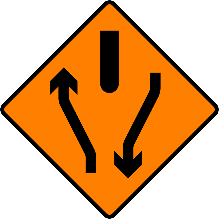 A common road sign in Ireland for start of central reserve or obstruction. Driving Theory Test revision.