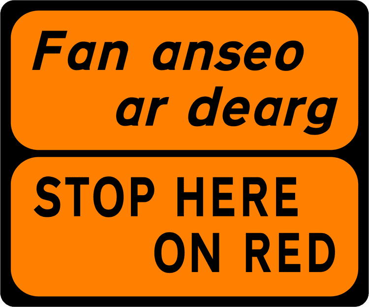 Irish Traffic Sign: Stop Here On Red A common road sign in Ireland for stop here on red. Driving Theory Test revision.