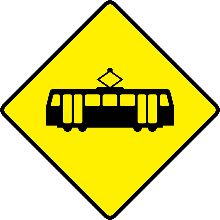 A triangular warning traffic sign in Ireland depicting tram crossing. Memorize for DTT.