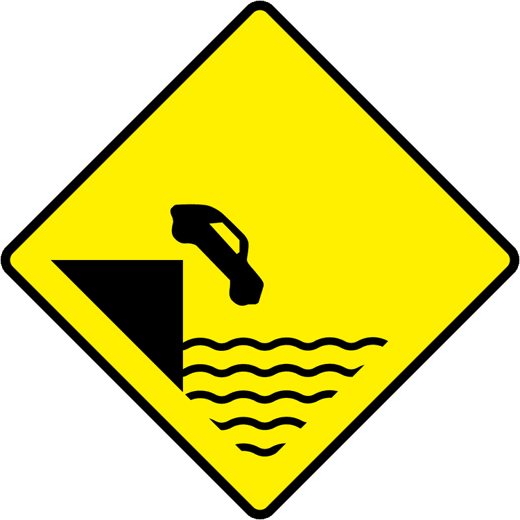 Irish Warning Sign: Unprotected Water - Driving Theory Test Prep A triangular warning traffic sign in Ireland depicting unprotected water. Memorize for DTT.