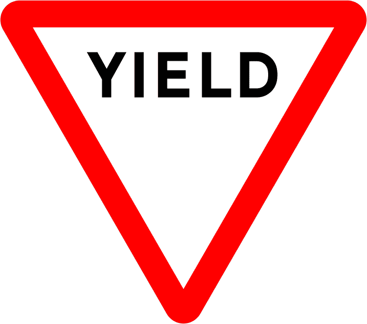 A regulatory road sign in Ireland enforcing yield. Essential for the Driving Theory Test.